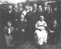 50th Wedding Anniversary of John Thompson and Aaste Marie Jacobson taken 7 July 1918.  Seated:  John & Aaste Marie;  kneeling, left: Thressa Schultz; kneeling, right: Arthur William Thompson.  Back row, L-R:  Oscar, Albert, Hans, Josephine, Tillie, Ludwig, Maren, John & Carrie Thompson