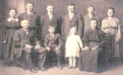 Back row, left to right:  Susanna (Schmitt) Hagel, John J Schmitt, Michael Bernard Schmitt, Paul Schmitt, Leonardus Schmitt, Bertilda (Schmitt) Hagel; Front row, left to right: Nicholous Schmitt (father), Joseph Schmitt, Lucille (Schmitt) Frendel & Elizabeth (Schwebach) Schmitt (mother).  Submitted by Carol Schmitt 